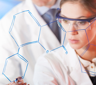 Female scientist with lab glasses looking at data